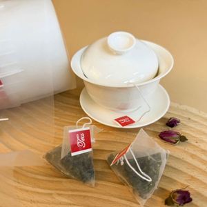 Rouleau de matériau en nylon pour sachets de thé avec ficelle et étiquette pour machine à ensacher le thé automatique, qualité alimentaire, logo personnalisé - Product Image 2