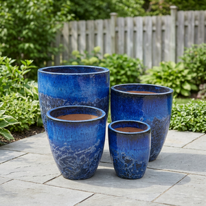 Ensemble de 4 pots de fleurs en céramique, bleu glacé, jardinières d'extérieur, design moderne et contemporain, écologiques, avec trous de drainage pour une utilisation en jardin - Product Image 1