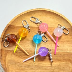 Porte-clés créatifs en forme de sucette arc-en-ciel, transparents, lumineux, en plastique acrylique, imprimés UV, accessoires durables, pendentifs pour sacs de bonbons - Product Image 1
