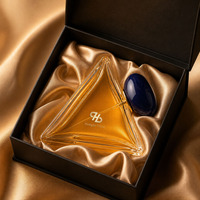 Flacon de parfum en verre triangulaire pyramidal de luxe avec bouchon bleu en forme de galet, logo personnalisé