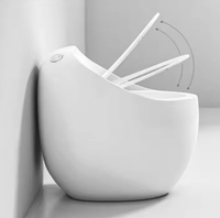 WC en céramique moderne blanc brillant en forme d'œuf, monobloc à jupe, à double chasse, à sortie verticale, économie d'eau, pour hôtels et villas