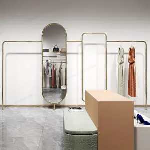 Современная металлическая подвесная витрина для женской одежды, вешалка для одежды, бутиковая Золотая настенная вешалка для одежды с зеркалом