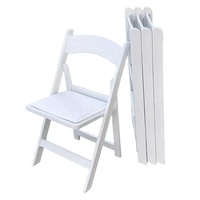 Chaise pliante en plastique, options noir et blanc, structure non empilable, dimensions pliées 42 x 88 x 10 cm, vente en gros