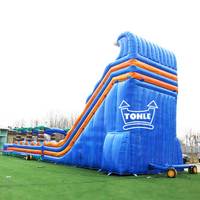 Toboggan aquatique gonflable commercial Tonle de 29 pieds de haut à double piste avec piscine pour locations événementielles