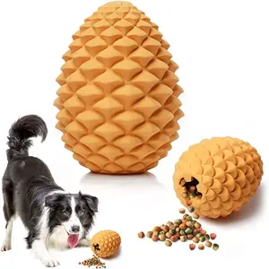 Venta al por mayor de caucho natural para mascotas masticar piña comida fugas bola perro juguetes ultra duradero no tóxico perro alimentador masticar Juguetes