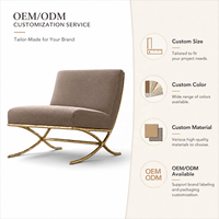 Fauteuil de salon en velours taupe de luxe, fauteuil d'appoint moderne sans accoudoirs avec cadre en X doré incurvé pour salon