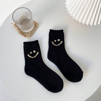 Vente en gros de chaussettes éponge pour le visage souriant Chaussettes pour femmes à friser de couleur unie Chaussettes personnalisées épaisses et chaudes souriantes pour le visage
