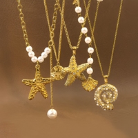 Collier pendentif océan en acier inoxydable plaqué or 18 carats pour femmes JUSNOVA |   Bijoux anti-ternissement étanches en perles et zircons en forme d'étoile de mer