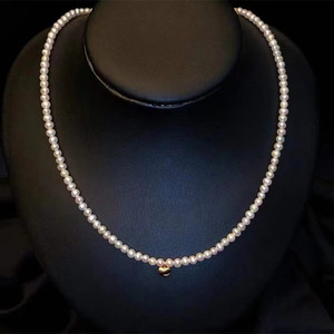 Collier pour femme en perles de millet d'eau douce naturelles au design simple et frais, avec pendentif en œil de chat, chaîne de clavicule, colliers de perles - Product Image 1