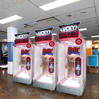 Machine distributrice de cadeaux en plastique à monnayeur, modèle Lucky 7 attrayant pour enfants, en promotion, pour centre commercial et salle de jeux