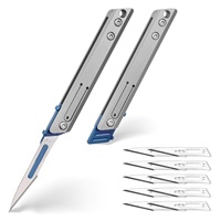 Mini couteau utilitaire portable avec pendentif porte-clés et lame détachable pour ouvrir les colis et couper le papier