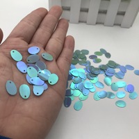 Vente en gros usine de paillettes ovales en PET 9*13 en forme d'œuf pour vêtements de scène, emballage de perles et décoration de sacs cosmétiques 26050701