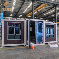 Casa Container Modulare Espandibile Moderna Prefabbricata con Telaio in Acciaio e Pannelli Ondulati Personalizzati, Porta a Doppia Ala in Vetro