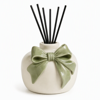 Bouteille diffuseur à roseaux en céramique rose personnalisée avec nœud, en porcelaine blanche crémeuse, pour huiles essentielles, flacon décoratif pour arômes et parfums, vente en gros