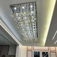 Lustre rectangulaire en verre étoile à quatre branches avec base en acier inoxydable, suspension LED à trois couleurs et intensité variable pour hall d'hôtel et décoration artistique
