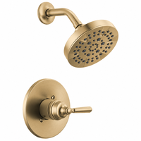 Système de douche en or brossé avec plaque frontale ronde, disque de buse noir, bras courbé, finition monocommande, vente en gros, usine OEM