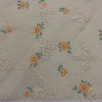Tissu brodé en coton biologique 100% personnalisable avec diverses couleurs et motifs pour vêtements, sacs et textiles de maison