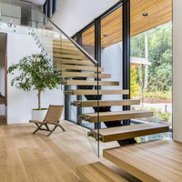 Escalier en acier contemporain Prima avec poutre centrale pour projets résidentiels de luxe