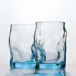 Taza de agua resistente al calor del hogar de cristal azul transparente de onda creativa