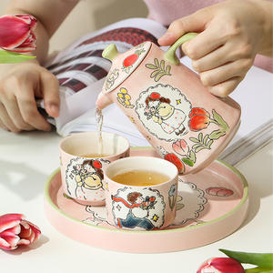 El juego de té de cerámica pintado a mano de estilo moderno incluye tetera y tazas de té con bandeja integrada para uso en el hogar o regalo para parejas - Product Image 2