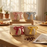 Ensemble tasse et soucoupe en céramique à motif de nœuds vibrants, peint à la main, pour café et lait