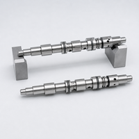 Bobine de vanne doseuse multi-canaux en acier inoxydable usinée CNC suisse sur mesure pour vannes doseuses pneumatiques et de fluides compactes