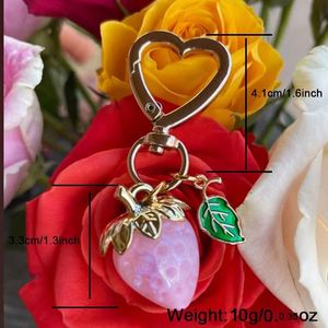 Wholesale Bulk Crystal Strawberry Keychain High Quality Metal <b>Bag</b> Pendant Suitable for Girls <b>Gift</b> 3D Crystal Strawberry Keychain - Product Image 4