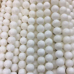 थोक दौर कार्बनिक रत्न सागर प्राकृतिक सफेद खोल Tridacna मोती कंगन गहने बनाने के लिए 4mm 6mm 8mm 10mm 12mm