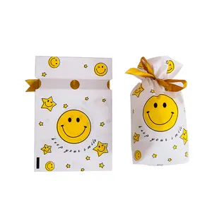 Basit sarı sevimli gülen yüz hediye ambalaj nougat kar tanesi gevrek aperatif ambalaj plastik torba İpli çanta