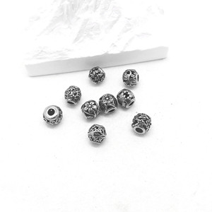 Perles entretoises florales en acier inoxydable Yunnique pour la fabrication de bracelets, composants de bijoux ronds moulés de 8 mm - Product Image 5