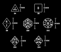 Dés polyédriques noirs mouchetés d'étoile de résine avec la numérotation blanche pour des jeux de rôle de table