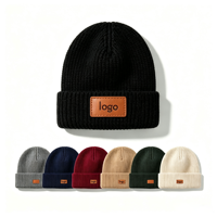 Bonnet d'hiver tricoté personnalisé OEM en gros, avec patch en cuir de haute qualité, décontracté, chaud, camouflage, nœuds, design, pour sport et extérieur