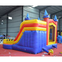 Château gonflable coloré avec toboggan, structure de saut commerciale pour les fêtes d'enfants en extérieur et les entreprises