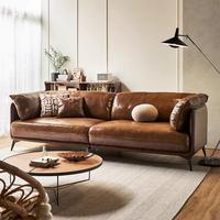 Ensemble de canapés modulaires en cuir véritable de couleur crème, design rond pour salon