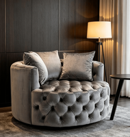 Fauteuil individuel pivotant de style américain, minimaliste et luxueux, en velours capitonné, moderne, rembourré en éponge, pour salons.