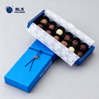 Boîtes en carton bleu recyclables avec pelliculage mat, imprimées sur mesure pour chocolats, idéales pour les événements et les magasins de luxe