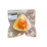 Boule de riz triangulaire au jaune d'œuf salé virale Xiaohongshu, en silicone souple anti-stress à rebond lent pour filles et garçons