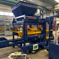 Équipement de production hydraulique QT4-15B pour les unités de béton utilisées dans les projets de logement, les routes, les cours et les travaux publics