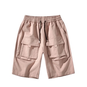 Vente en gros de pantalons courts hip-hop personnalisés pour garçons ensemble de shorts cargo roses avec cordon de serrage pour hommes - Product Image 1