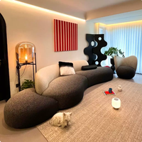 Canapé modulable minimaliste italien, conçu pour les salons de toutes tailles, avec un tissu en forme d'arc et à motif ciel étoilé dégradé