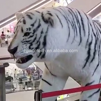 Modèle de tigre blanc animatronique de grande taille fabriqué pour centre commercial ou exposition interactive réaliste de robot animal pour place publique