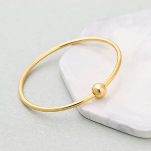 Xinfly Pulsera de Oro Genuino de 18K con Tornillo, Tubo Redondo Pulido, Cuentas Huecas, Brazalete Redondo de Lujo, Joyería - Product Image 1