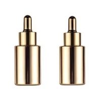 Flacon compte-gouttes en or personnalisable de luxe 30 ml 1 oz pour soins de la peau, emballage en verre avec bouchon compte-gouttes doré avec revêtement UV