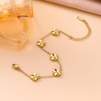 Bracelet tendance en acier inoxydable plaqué or 18 carats avec zircon et trèfle à quatre feuilles pour femmes