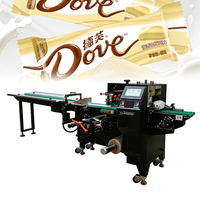 Machine d'emballage alimentaire entièrement automatique SZ-450 pour sachets de 30 à 100 unités/min, largeur de film 290-450 mm, pour snacks, chocolats et autres produits.