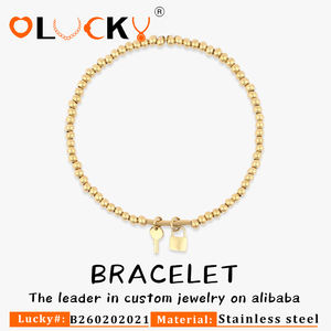 Fabricante de Joyería Personalizada LUCKYJIU, Pulsera Elástica de Acero Inoxidable con Baño de Oro de 18K, con Cierre y Dije de Llave, Venta al Por Mayor - Product Image 1