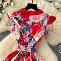 Robe longue élégante pour femme à imprimé floral, coupe trapèze, sans manches, col rabattu avec ceinture et boutons décoratifs, idéale pour le quotidien et les vacances