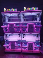 Machines de jeu de grue personnalisables avec choix de couleurs, effets lumineux LED et designs thématiques pour les zones de divertissement familial