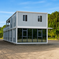 Maison préfabriquée modulaire détachable en conteneur, structure en acier, avec mur-rideau en verre de luxe à deux étages pour bureau