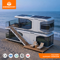 Maison capsule de luxe moderne à deux étages en conteneur préfabriqué de 40 pieds avec cuisine, chambre, salle de bain et énergie solaire pour usage hôtelier